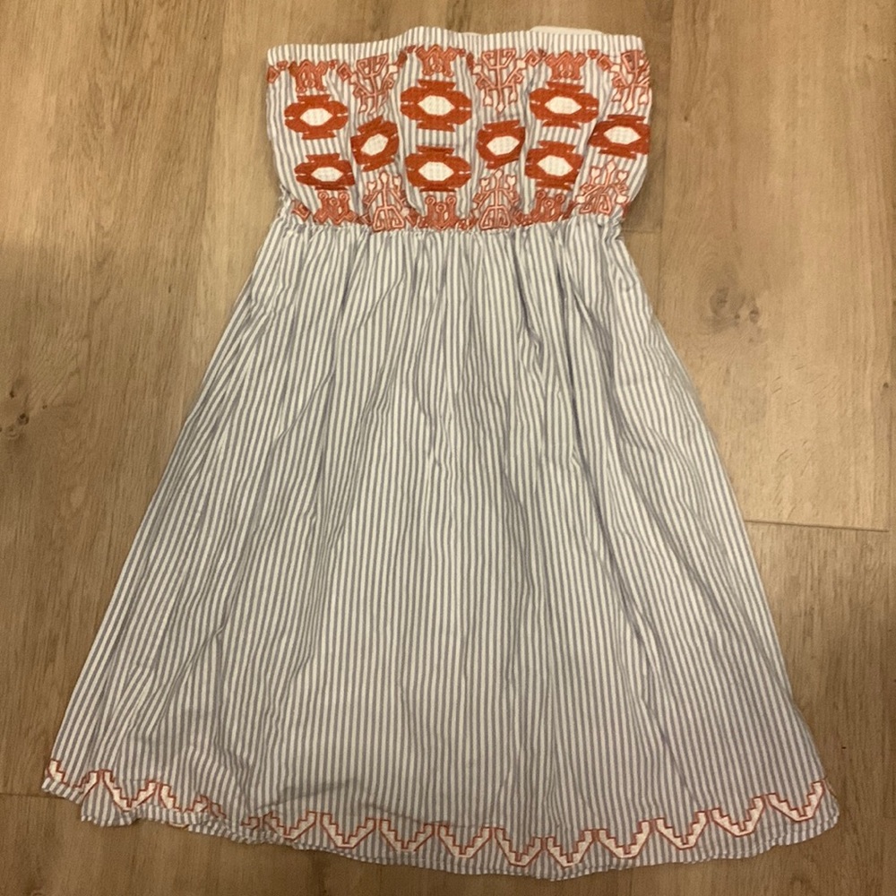 mini strapless blue and white striped dress w/ burnt orange embroidered shapes
